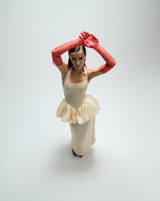 Champagne, satin halter neck peplum top. Front