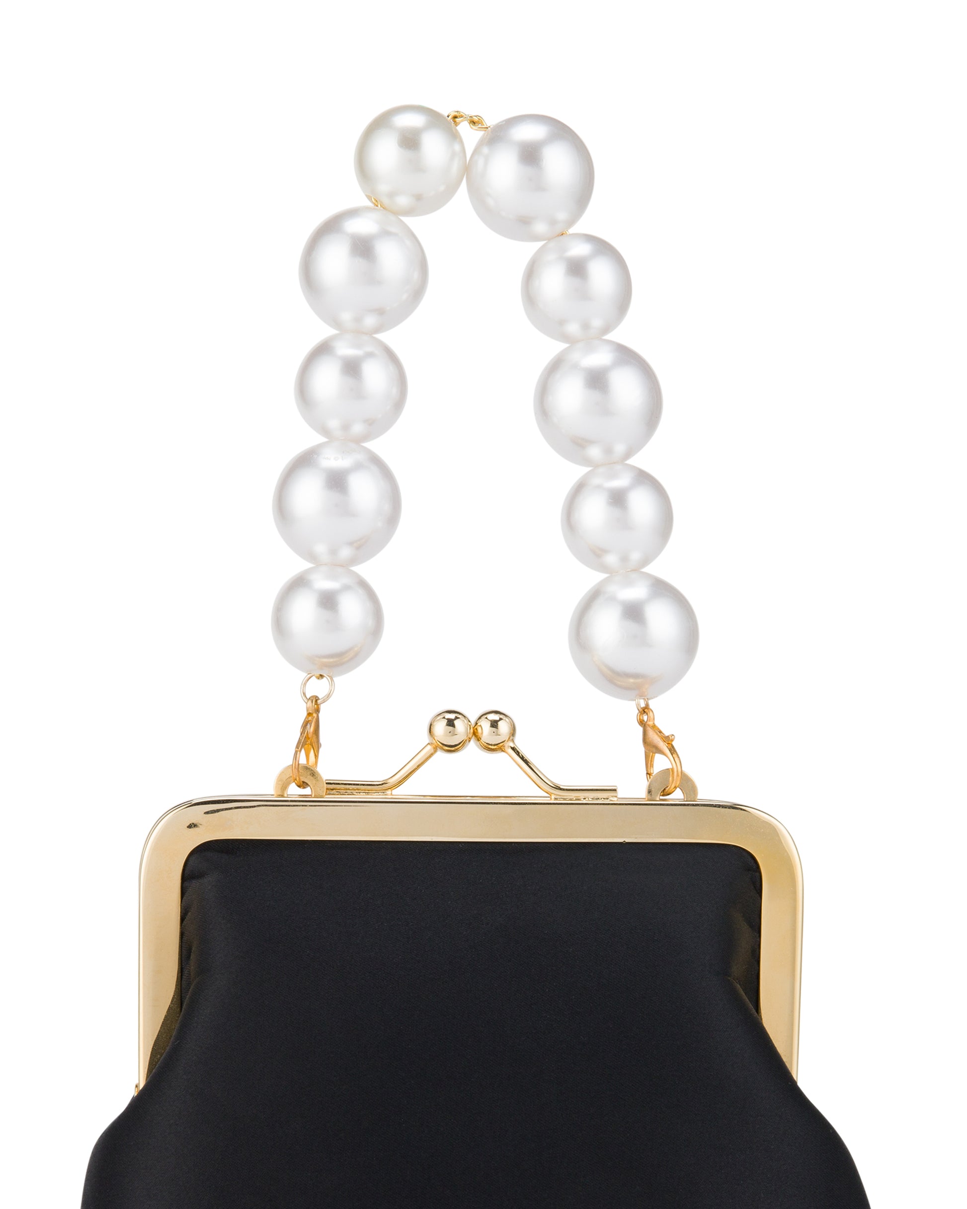 Pearl handle black bag with gold chain. Close up.