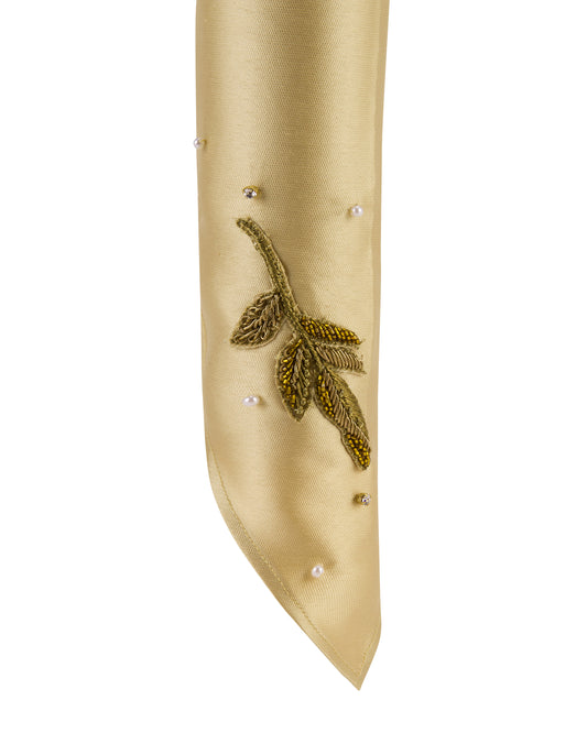 Gold long gloves with embroidery. Close up. 