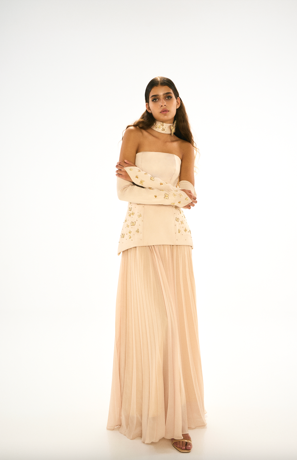 Satin champagne fitted corset style dress with embroidery and pleated chiffon skirt. Front. 