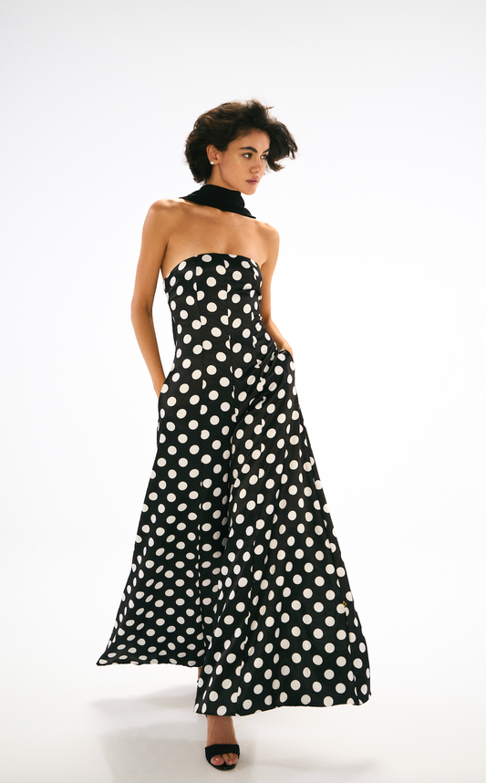 Polka dot fitted jumpsuit with shawl. Front