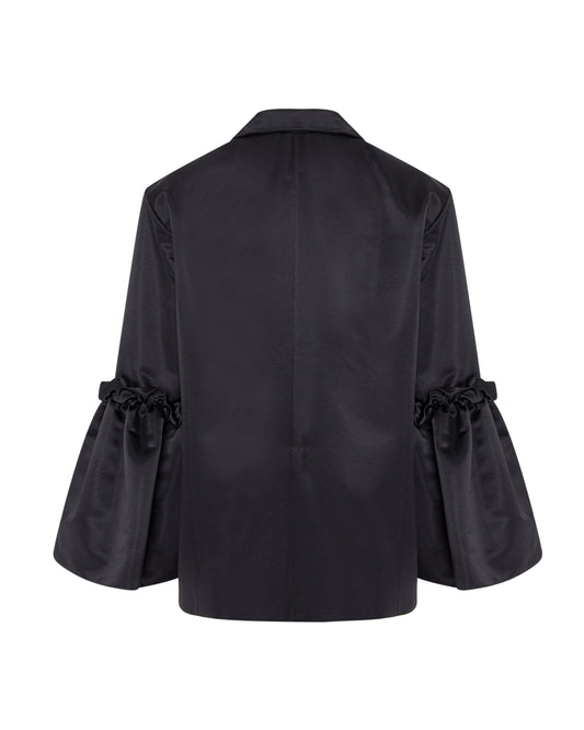 Black satin blazer with ruffled sleeves. Back