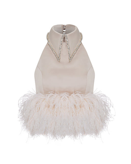 Crystal collared champagne satin top with feather trimmed hem. Front